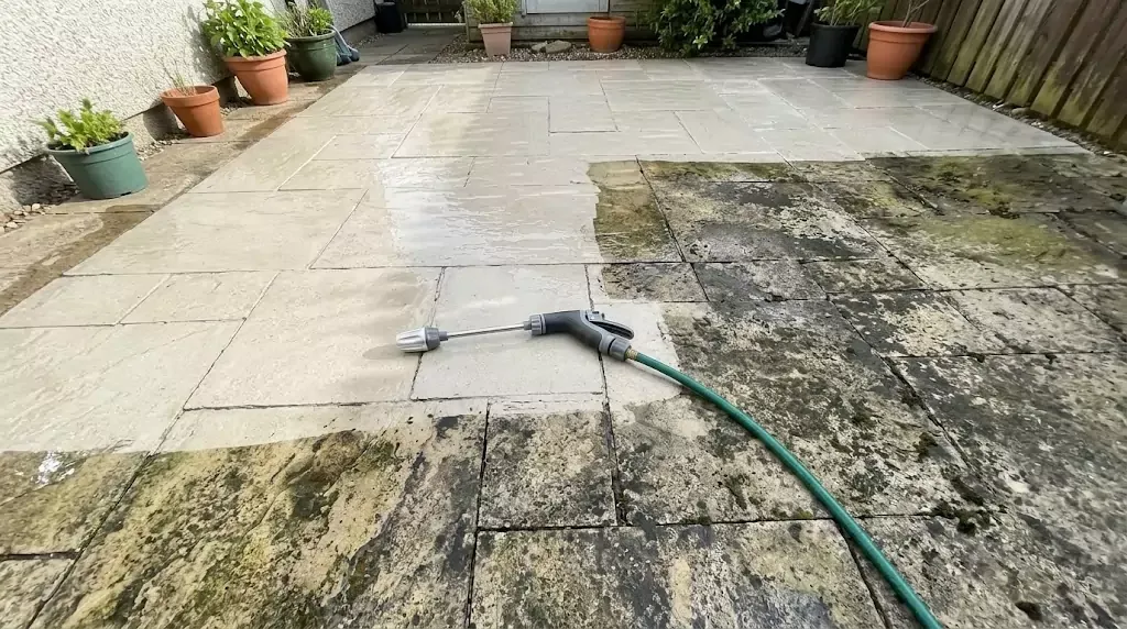 Power Blast Plus test on a 350-sq-ft stone patio &mdash; clear line between cleaned and uncleaned section